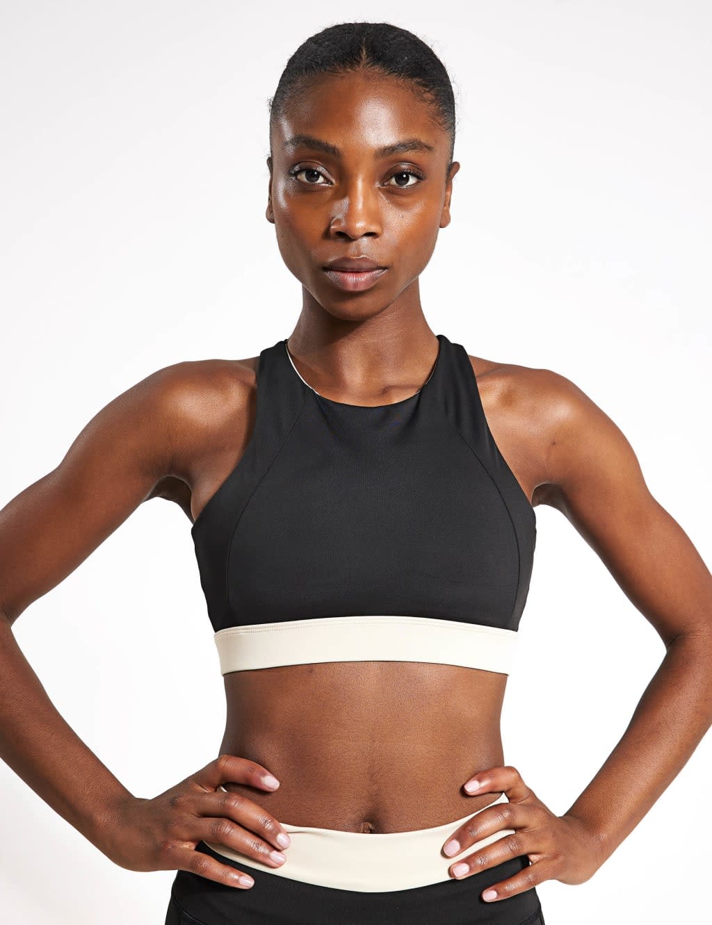 Woman wearing cross back crop top