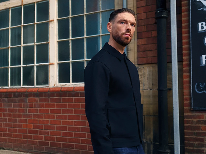 James Nelson Joyce wearing an Autograph navy shacket