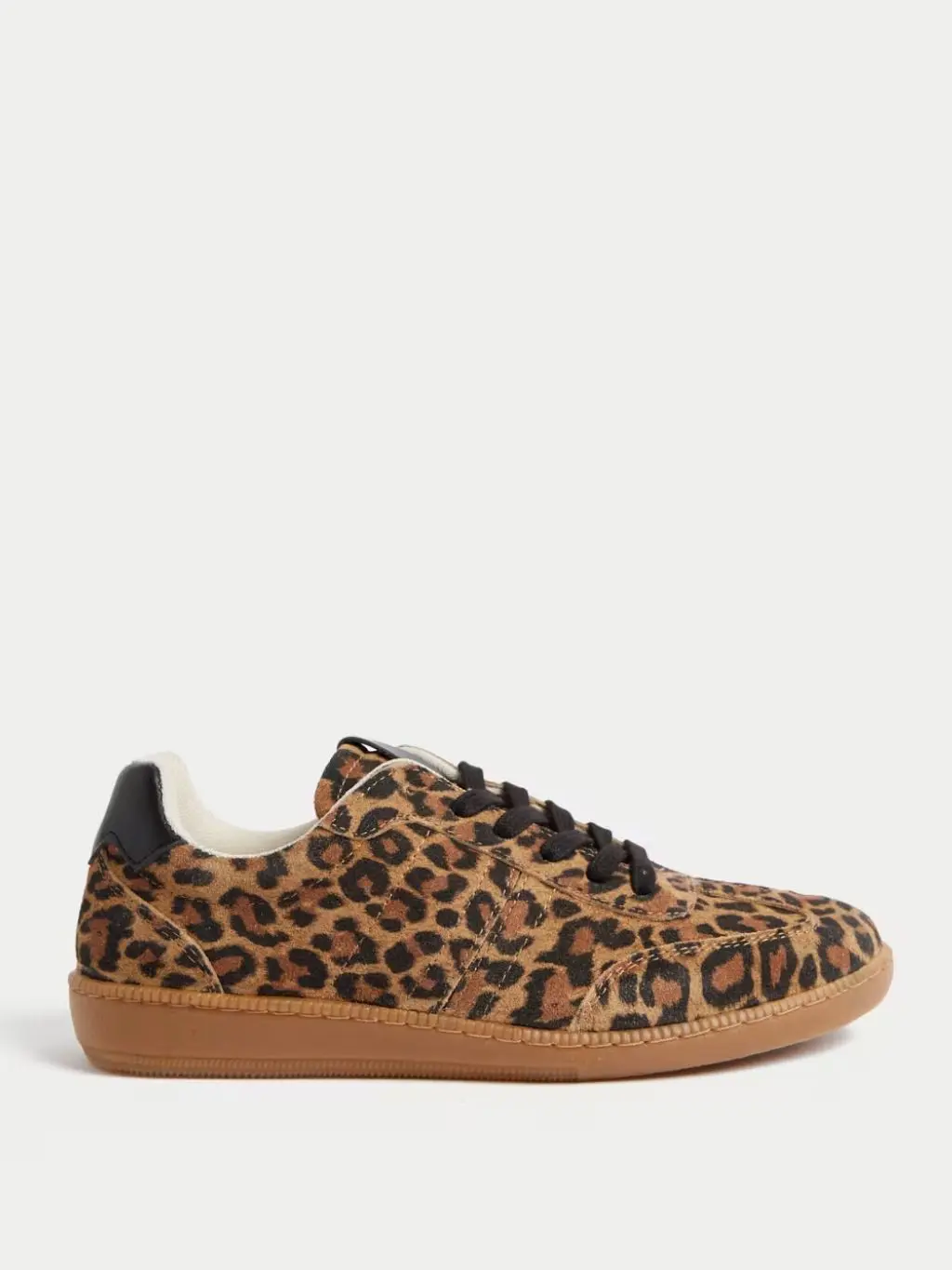 A cutout of leopard print trainers, sideways view