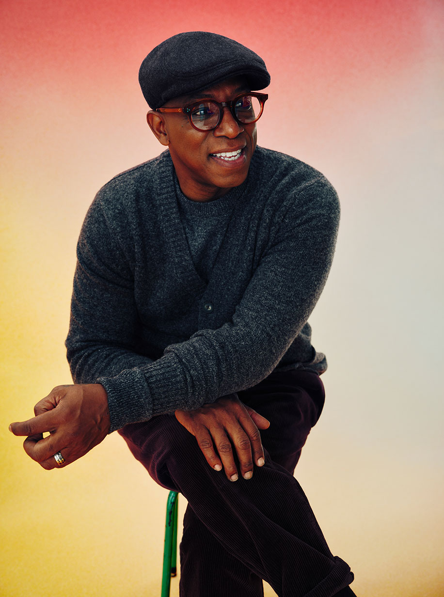 Ian Wright wearing a flat cap from the M&S x Ian Wright hat collection.