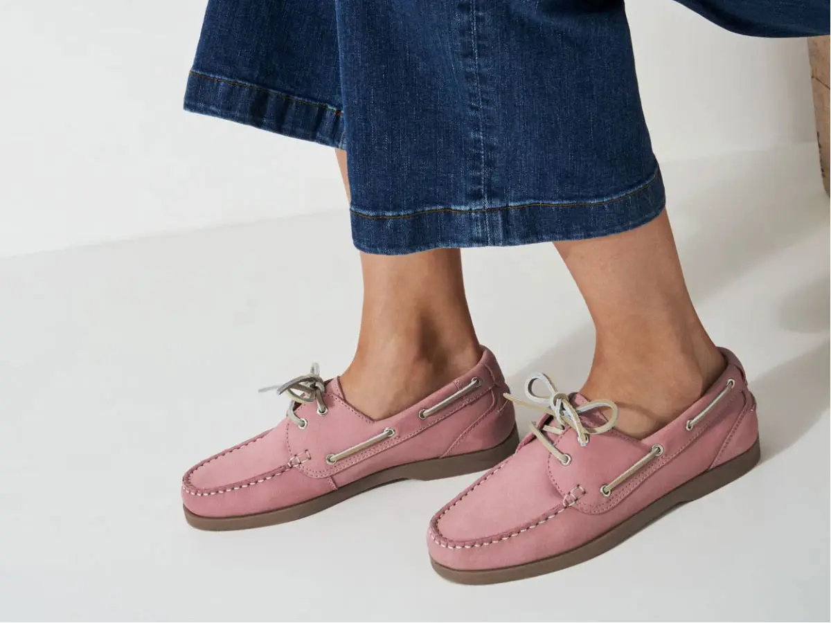 Close up of woman wearing pink boat shoes
