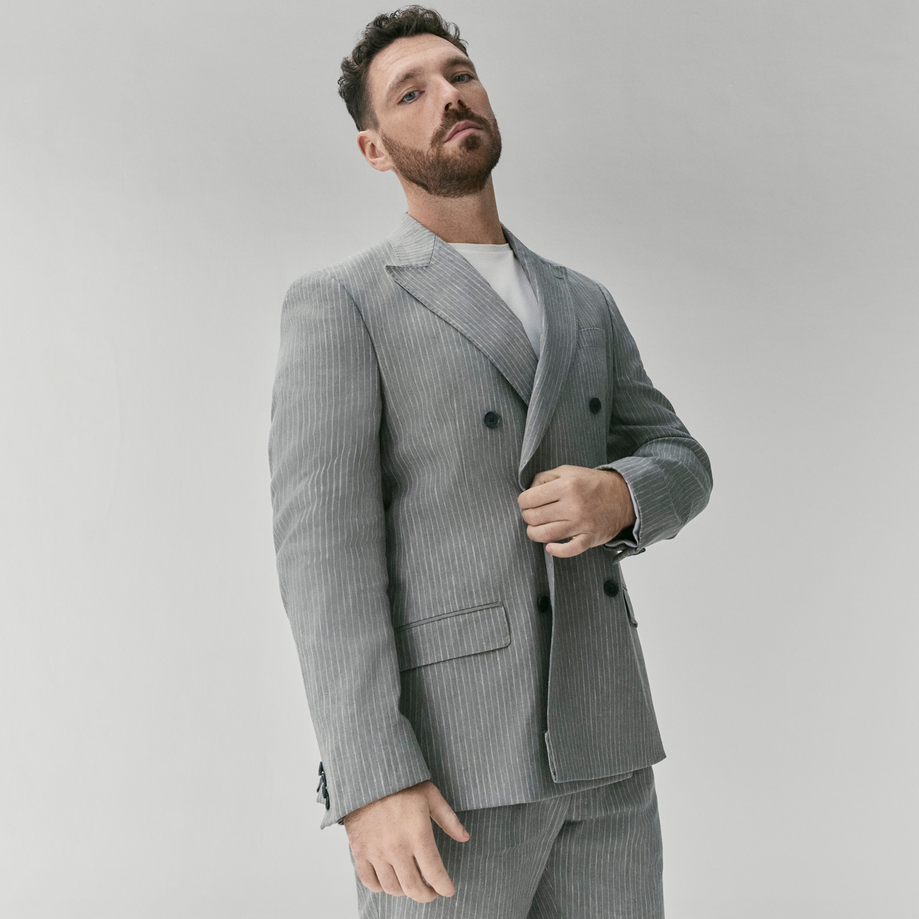 Man wearing grey suit