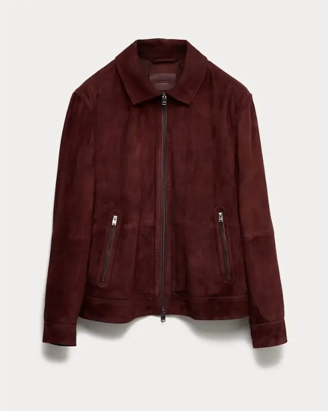 A cutout of a burgundy suede collared jacket by Jaeger