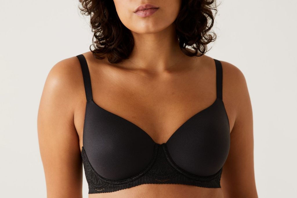 Woman wearing black full-cup bra. Shop full-cup bras