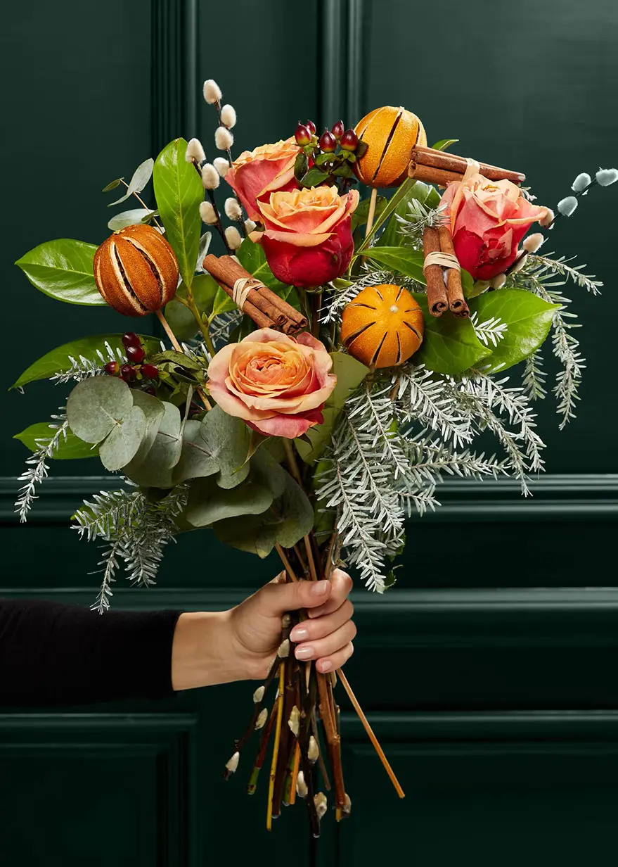 Bouquet of festive orange roses by M&S