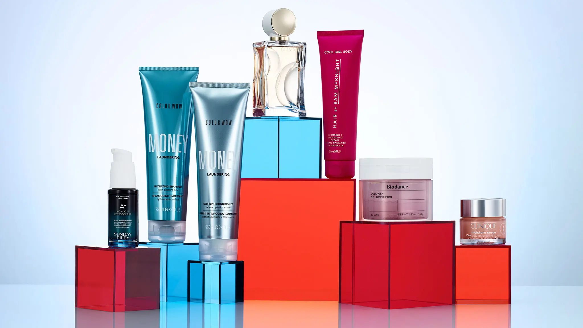 Skincare products on orange and blue blocks