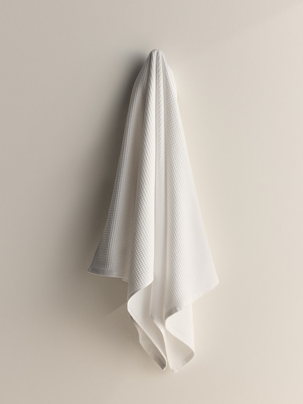 Towel hanging on wall
