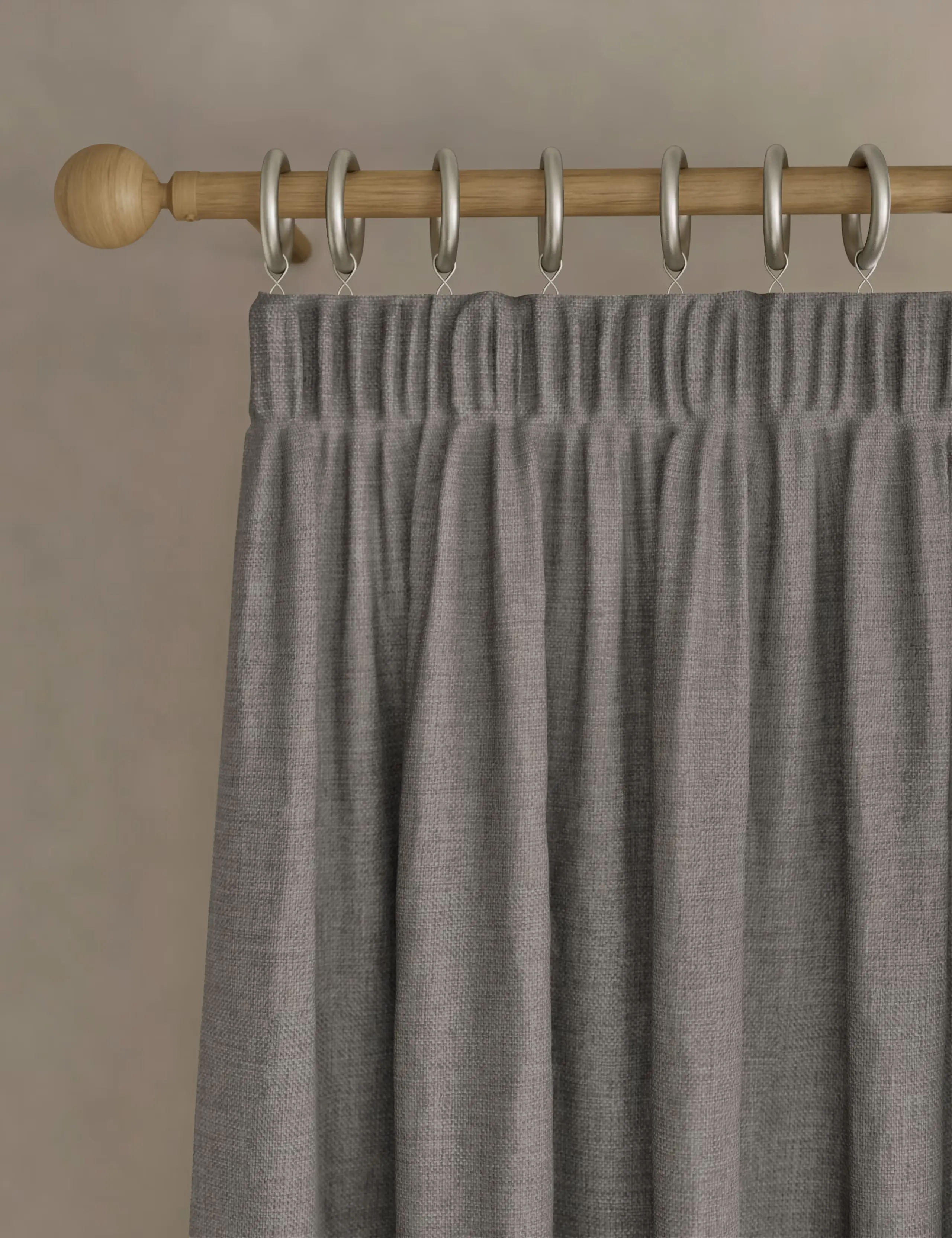 Gray curtain on woden rod
