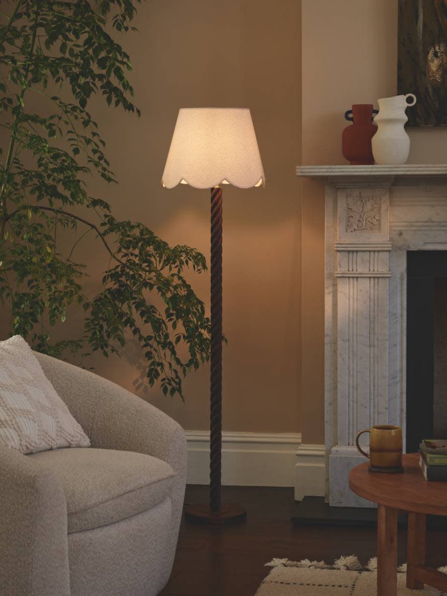 Floor lamp with a frilly lamp shade