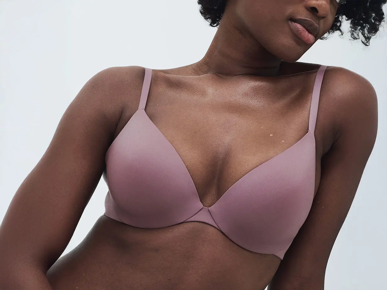 Woman wearing pink bra