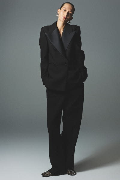 Woman wearing black suit