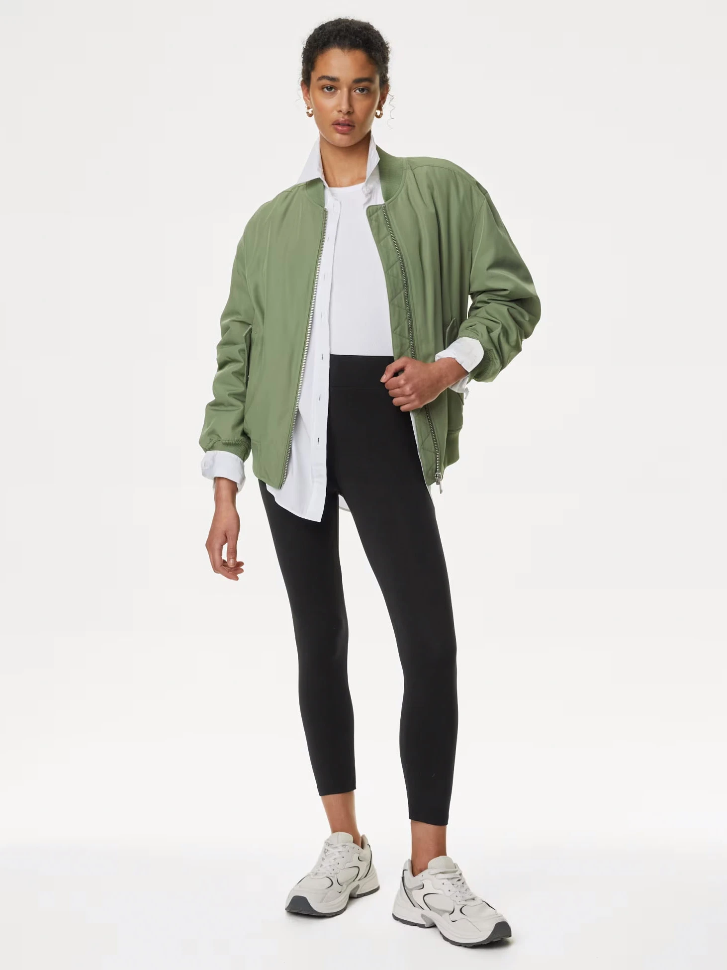 Woman wearing athleisure outfit. Shop activewear