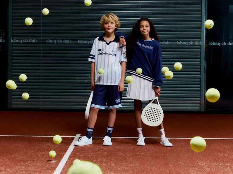 Boy and girl on padel court
