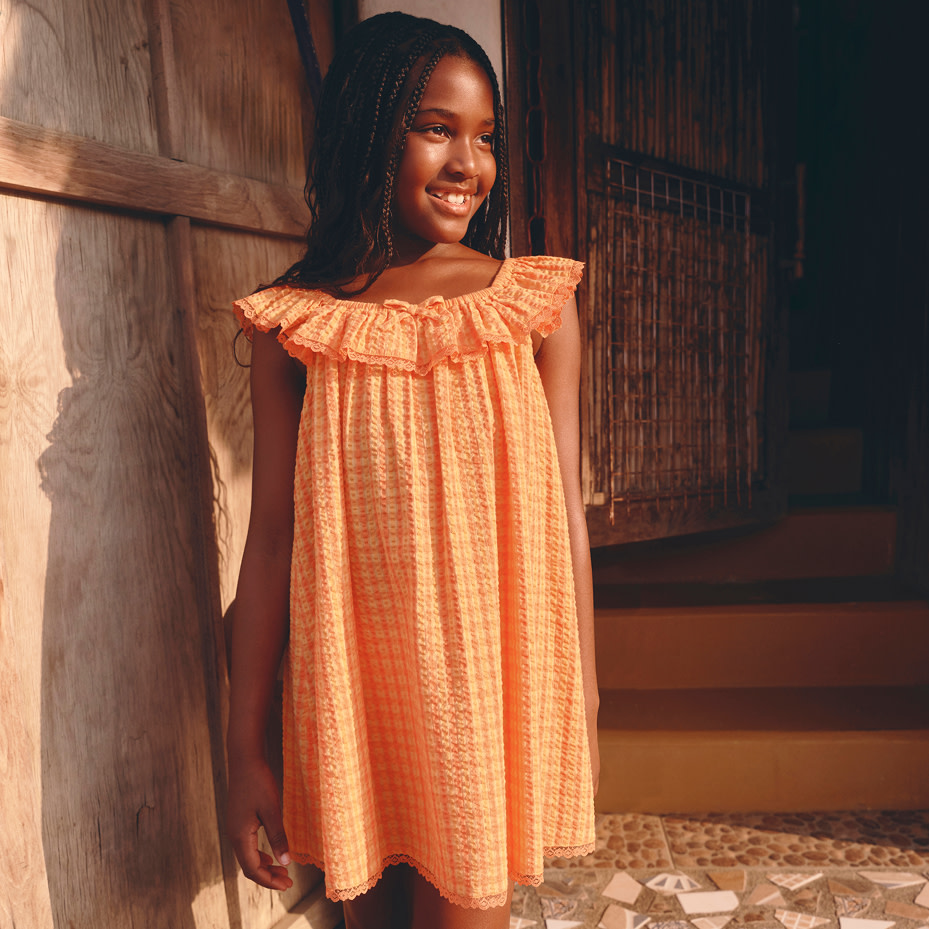Girl wearing orange dress
