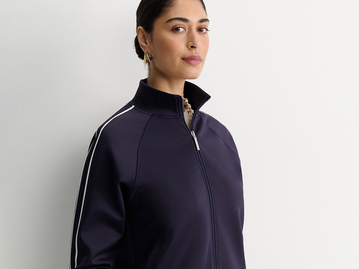 Woman wearing a navy sports jacket