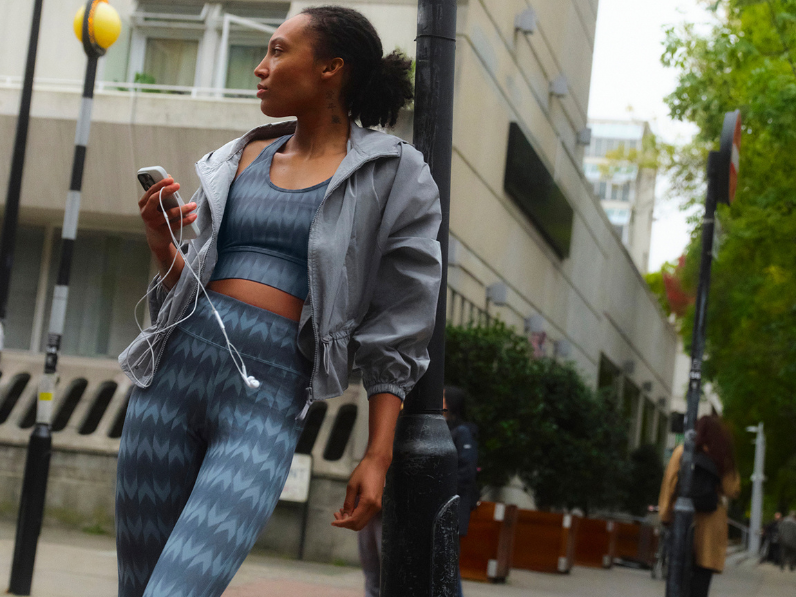 Woman preparing for run wearing running outfit