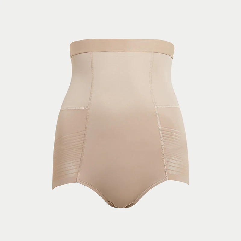 Beige waist-cinching knickers. Shop now