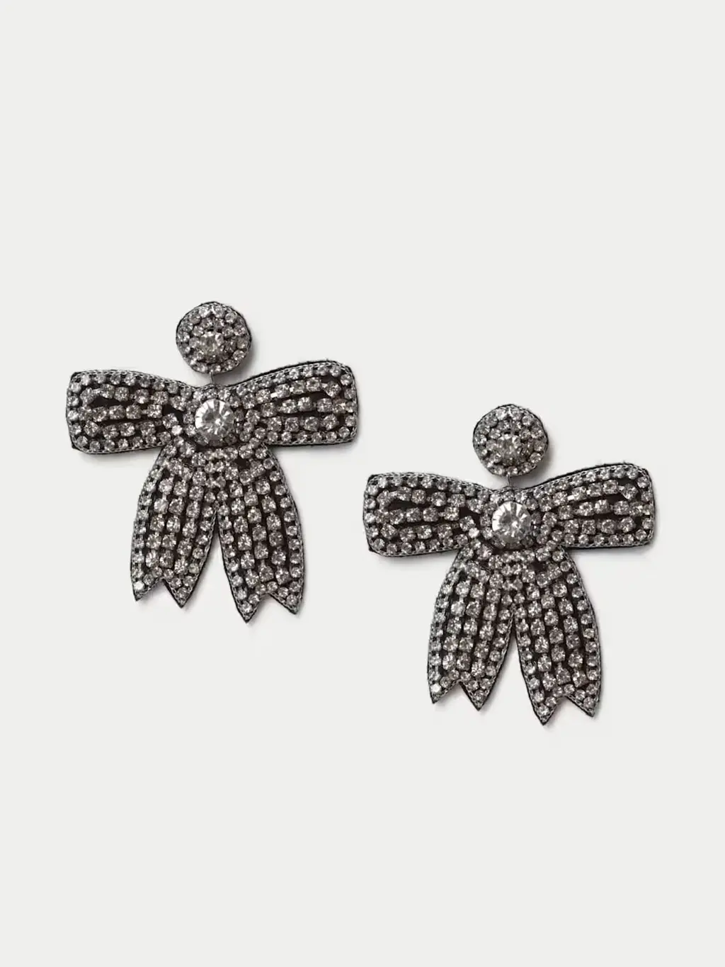 Silver rhinestone bow earrings