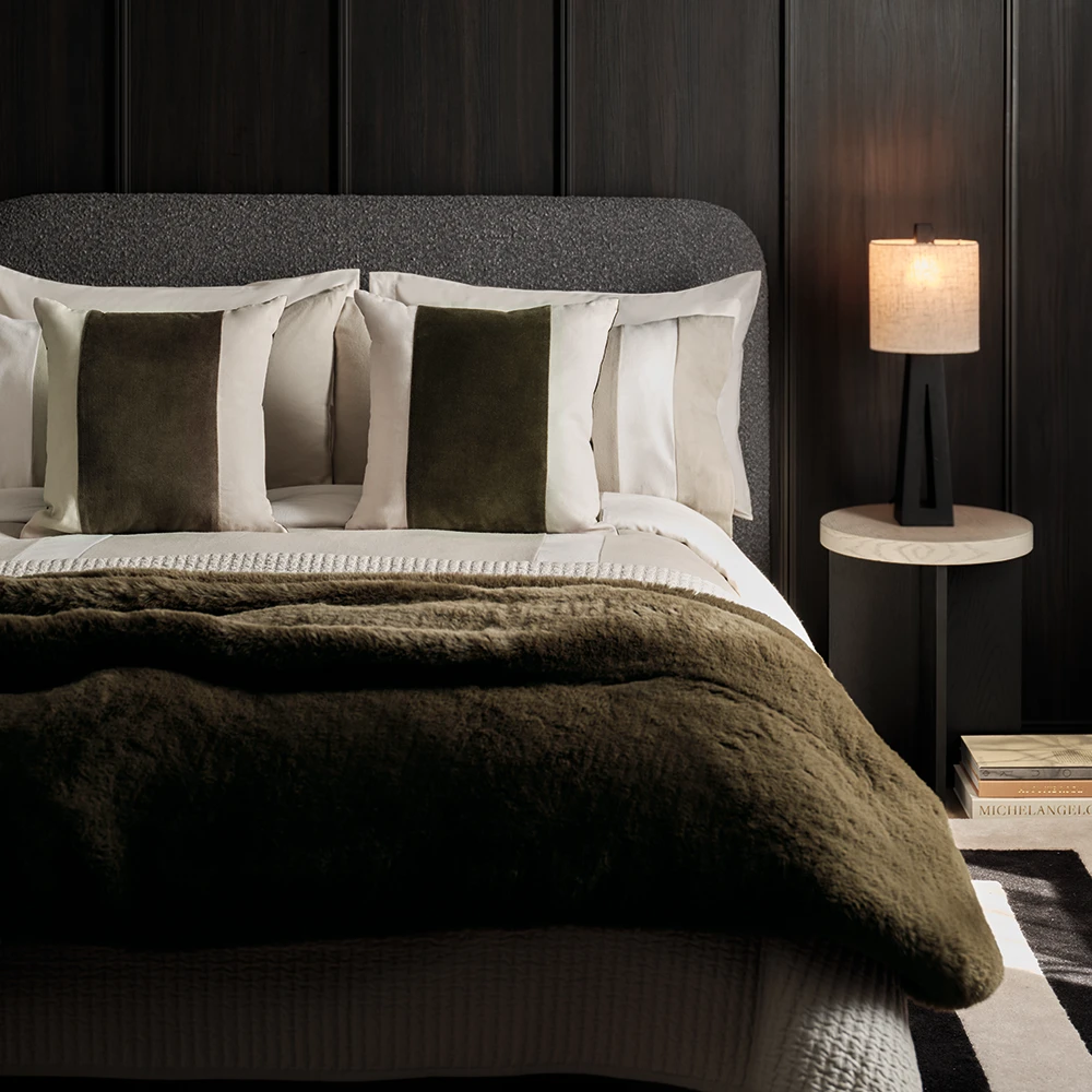 Bedroom made up with khaki velvet and cream M&S X Kelly Hoppen bedding