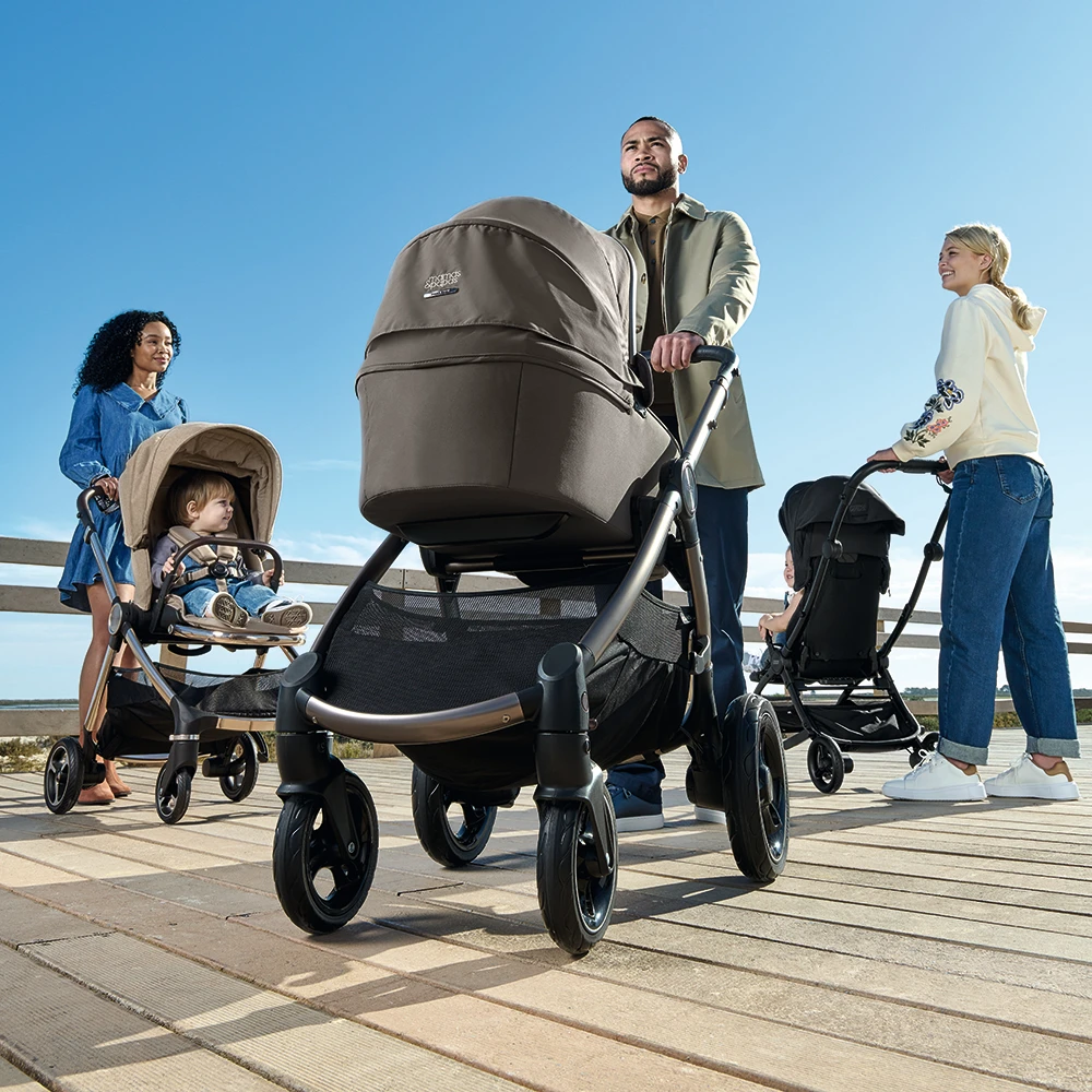 Group of people with Mamas & Papas pushchairs. Shop now