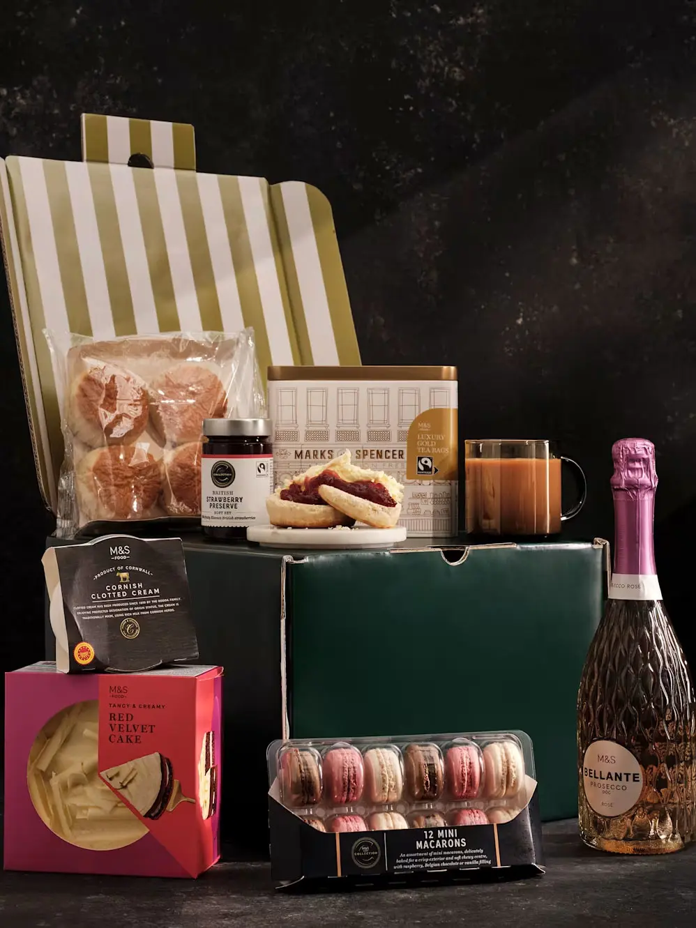 Afternoon tea hamper with prosecco, macarons, red velvet cake, scones, jam, clotted cream and tea