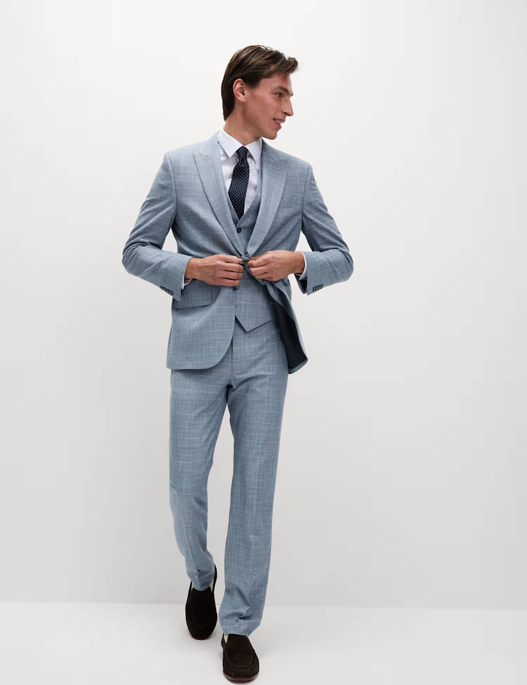 Man wearing grey suit and white shirt at M&S