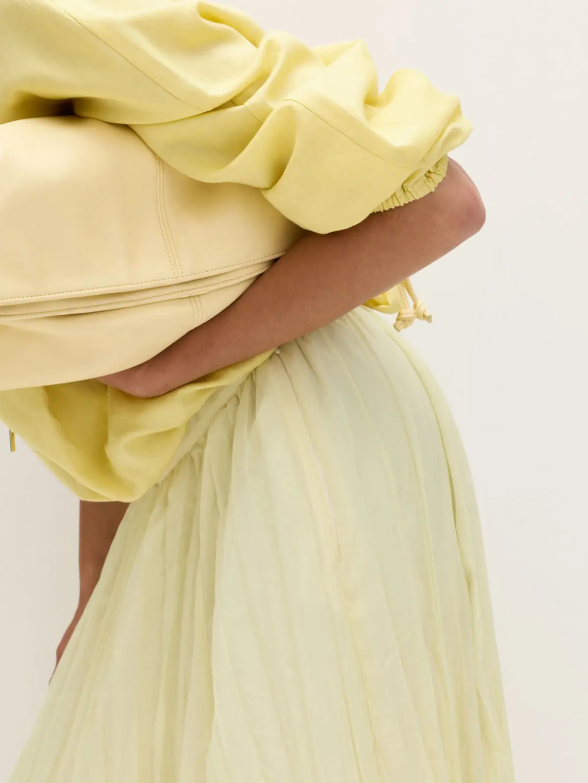 Woman wearing all-yellow outfit 