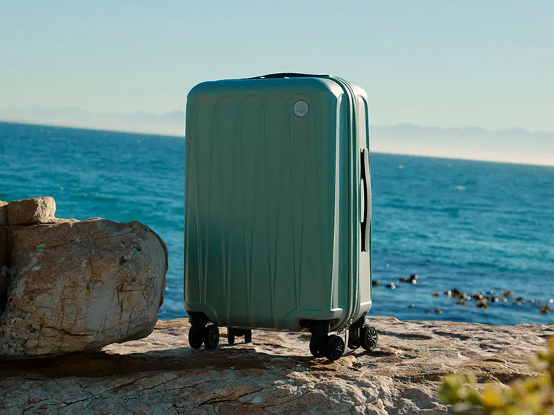 Suitcase by the beach