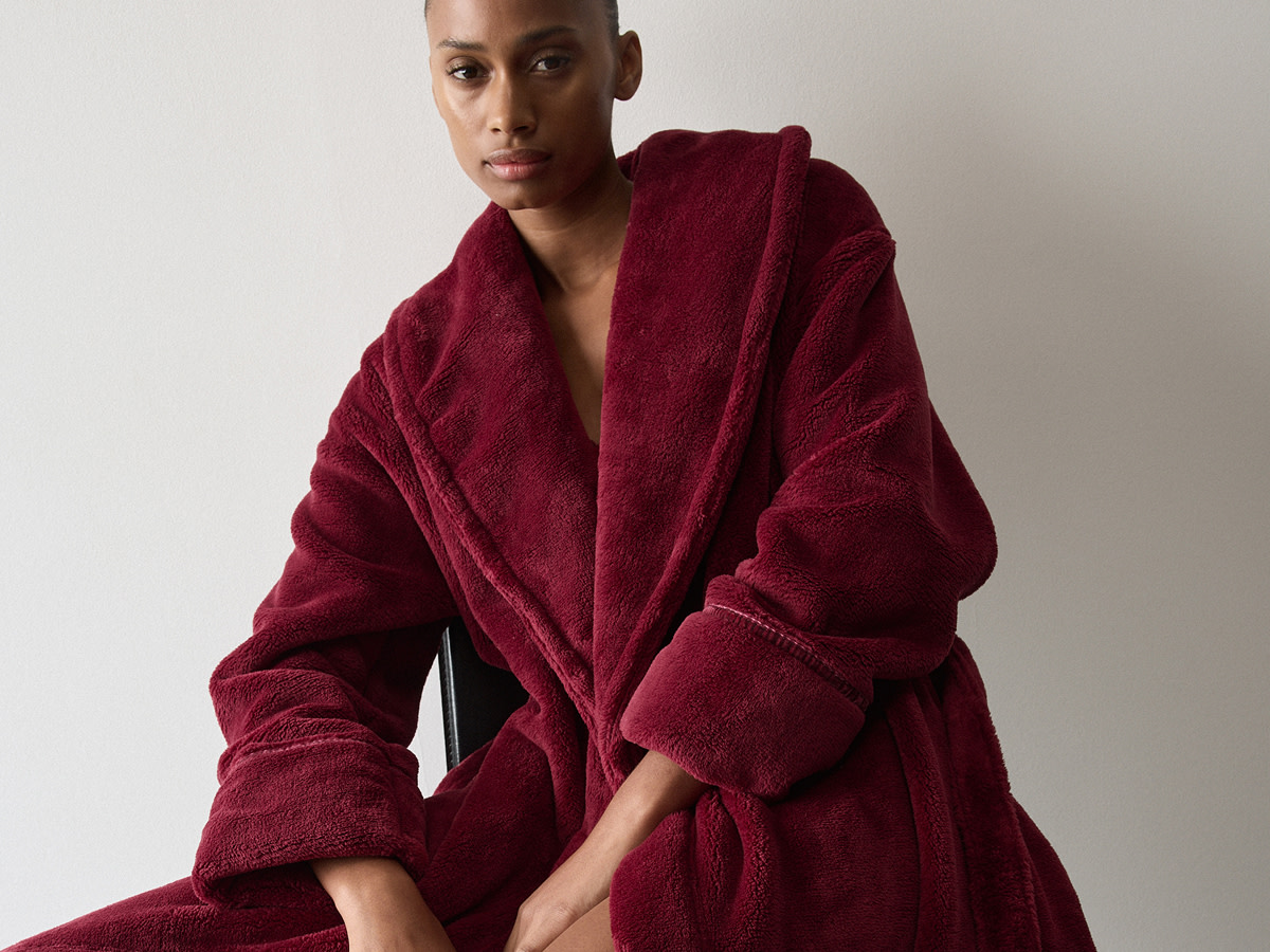 Woman in red dressing gown