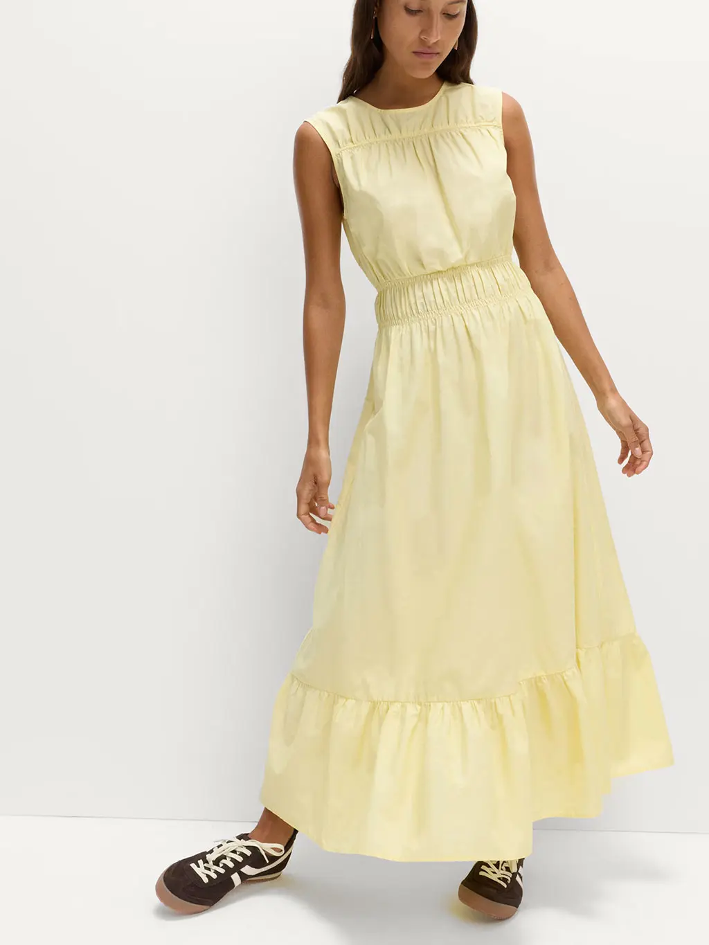 Woman in yellow maxi dress