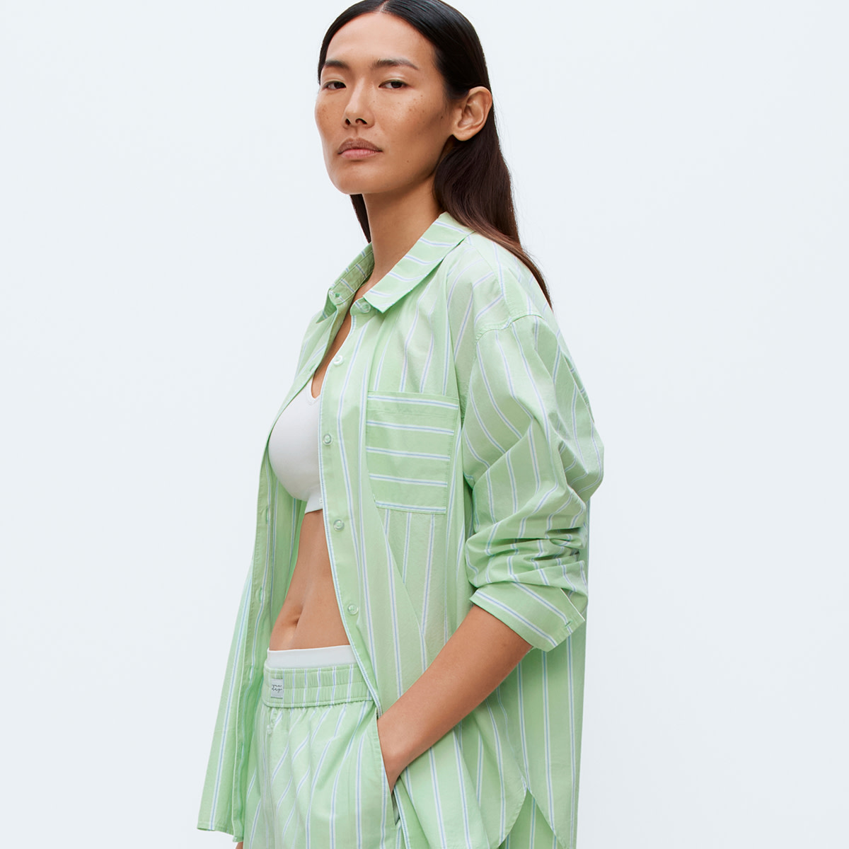 women wearing green and white nightwear