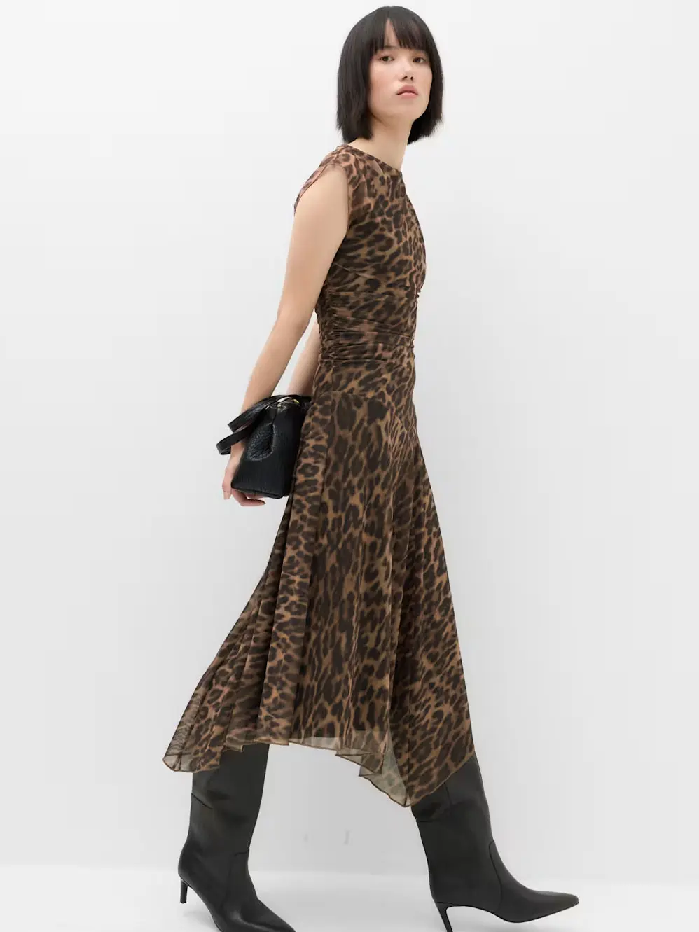 Woman in leopard print dress