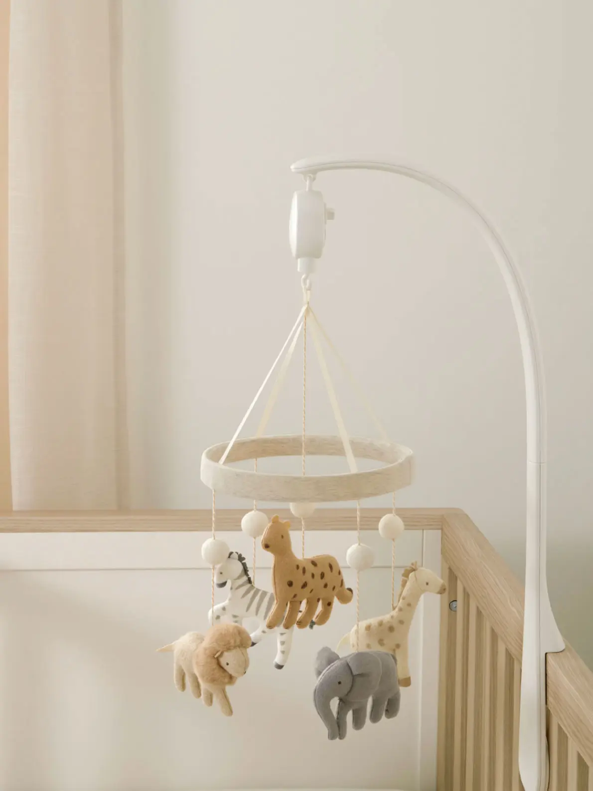 Children's hanging mobile with soft toy animals