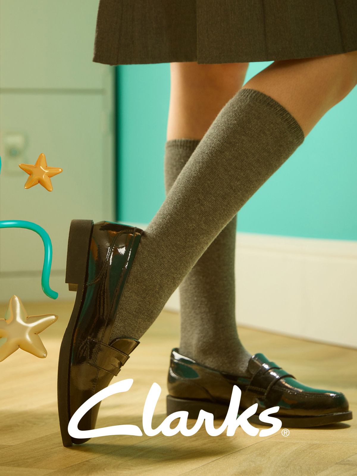 Child wearing schoolwear and Clarks shoes