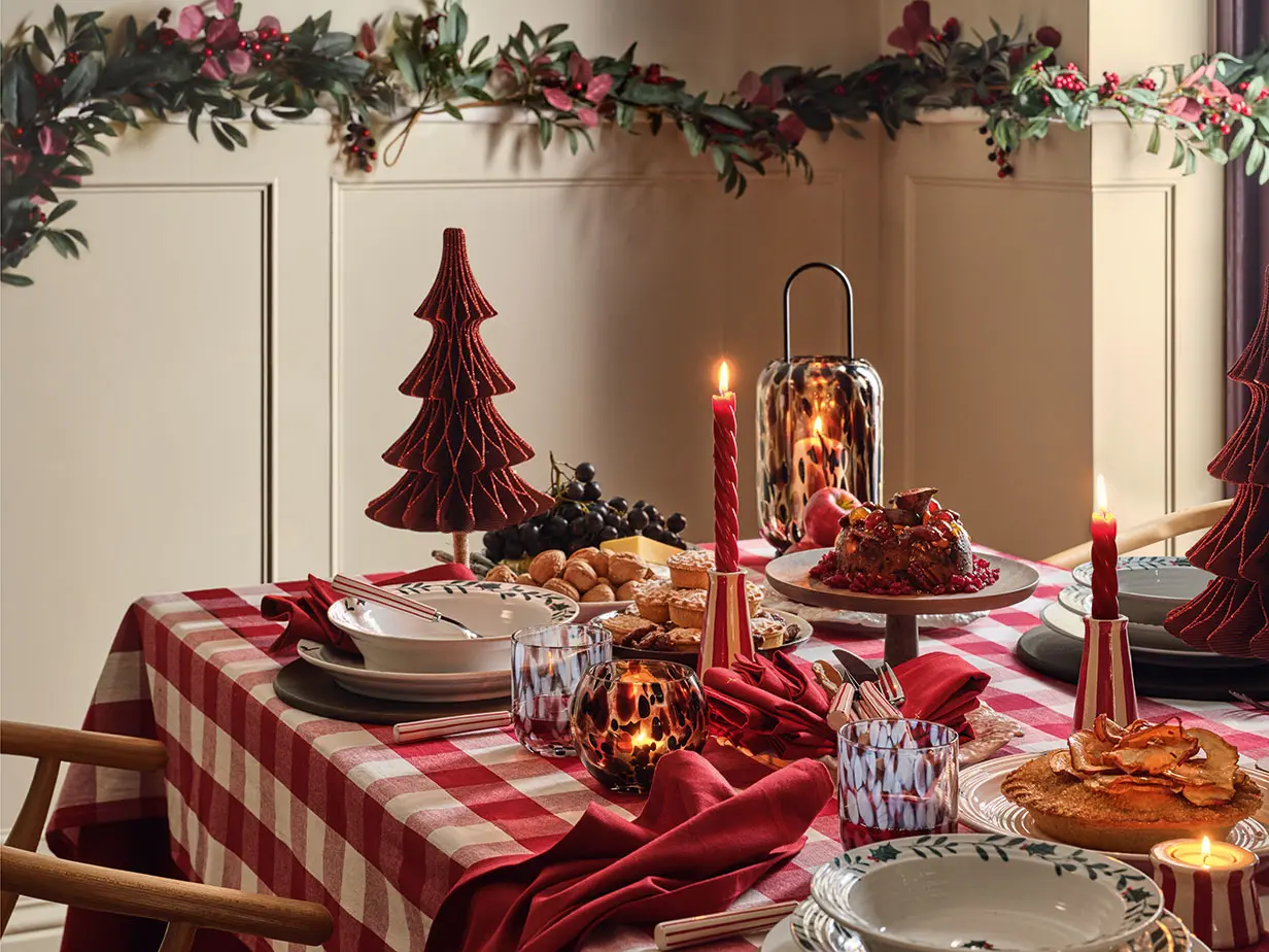 Room showing Christmas table with decorations at M&S