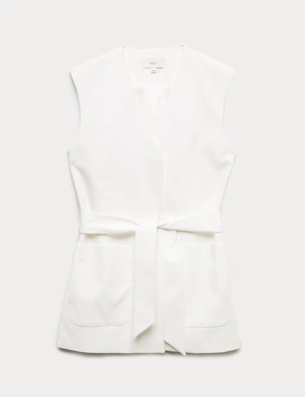 White sleeveless jacket