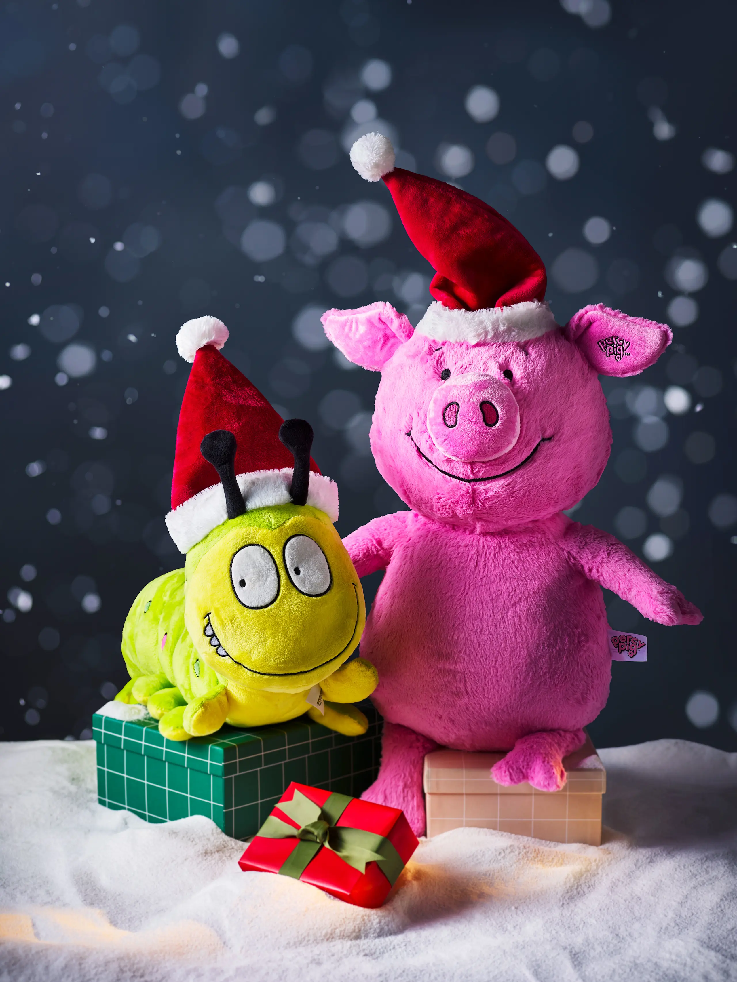 Image of Colin the Caterpillar and Percey Pig soft toys