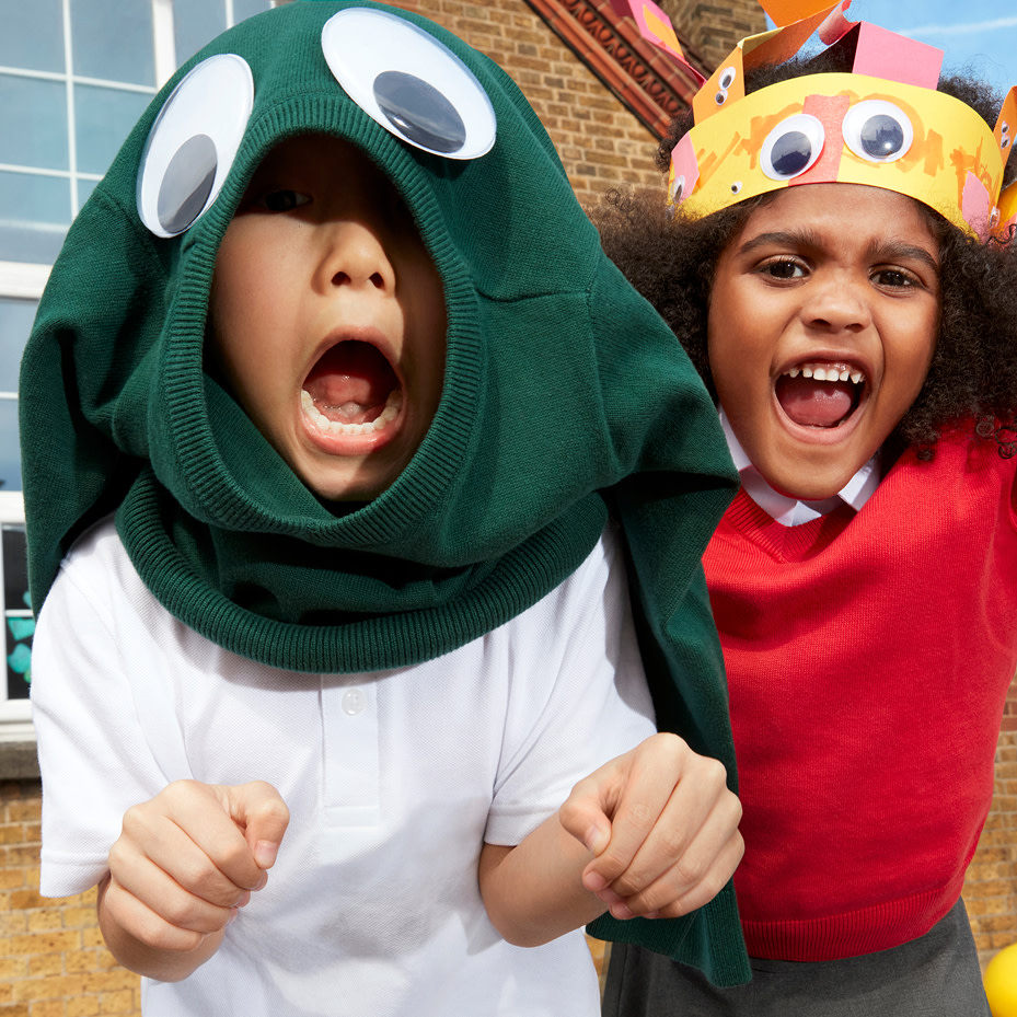 Two kids playing with jumpers