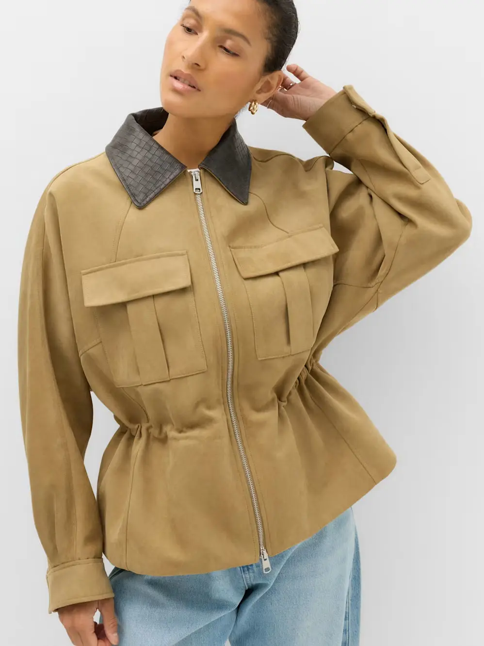 Woman in utility coat