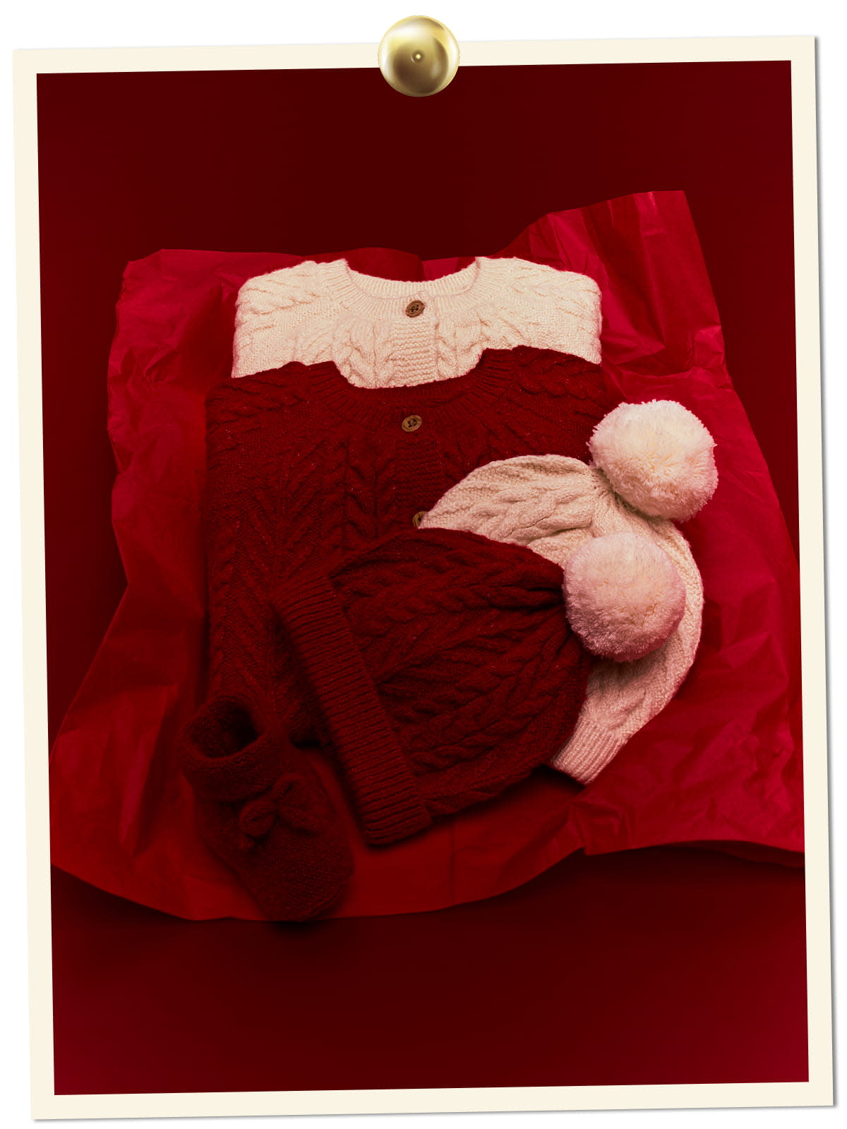 Two red and white jumpers, two beanies