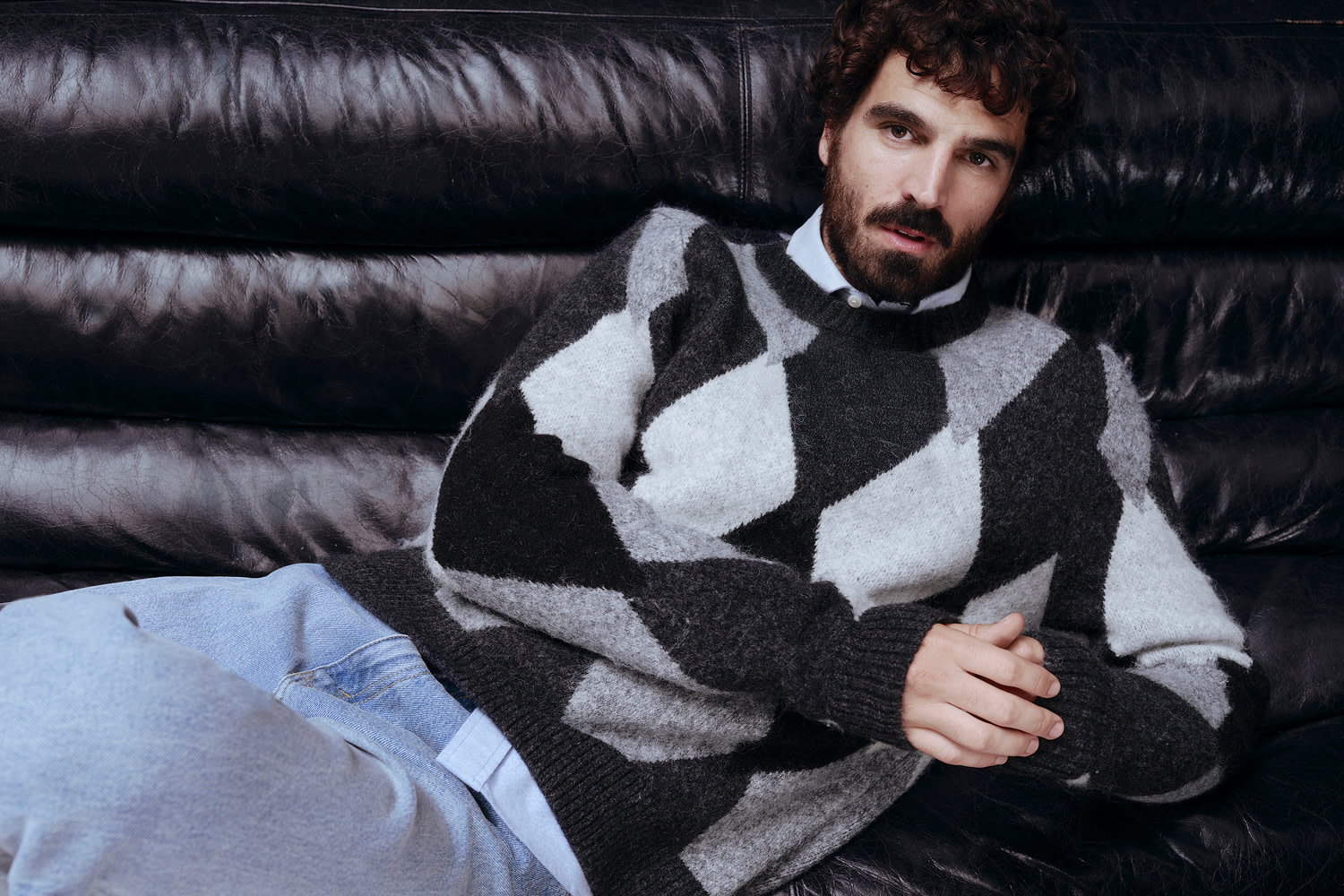 Man wearing Argyle jumper