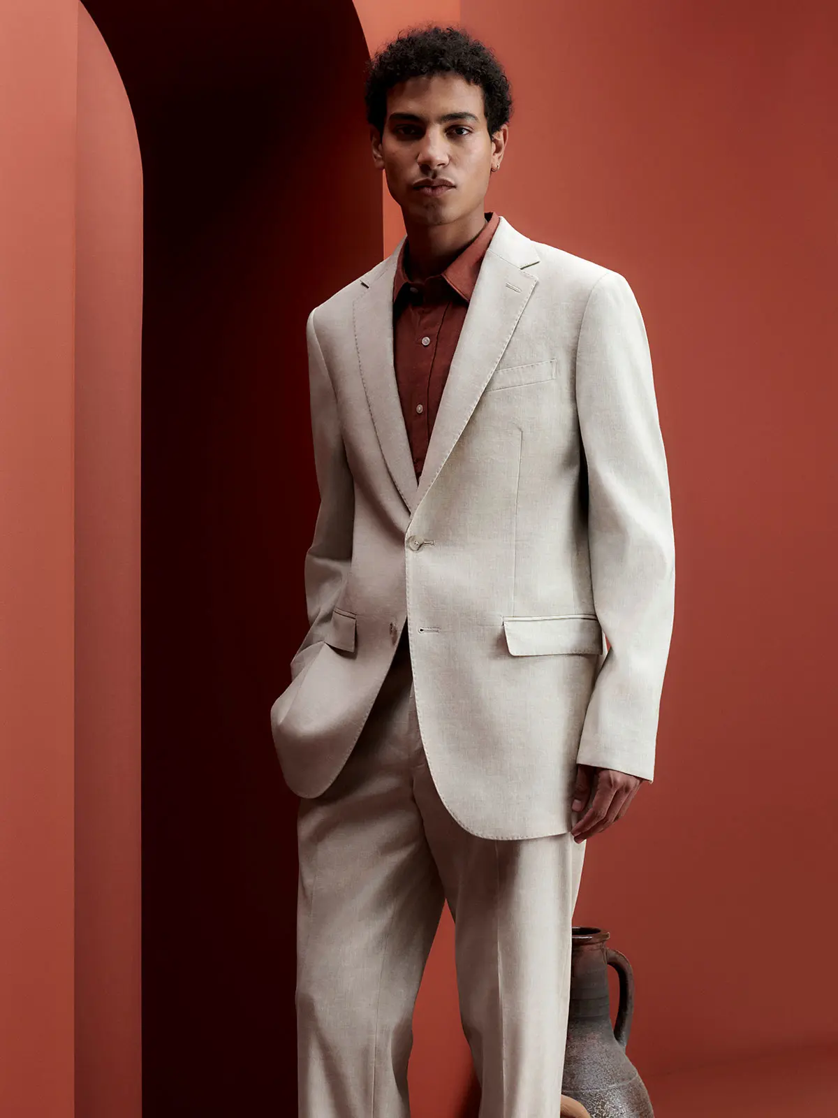 Man wearing white suit