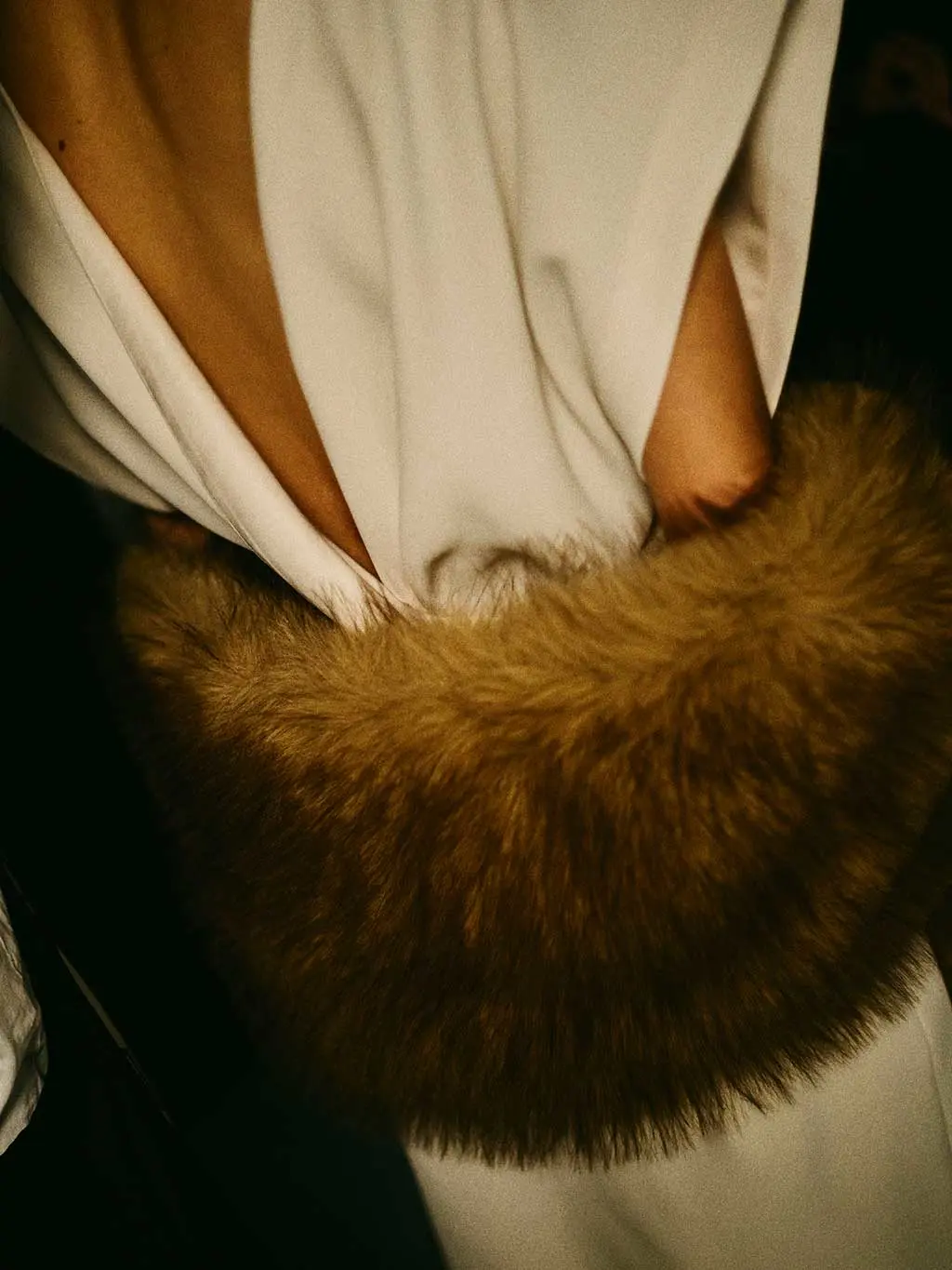 Woman wearing fur shawl