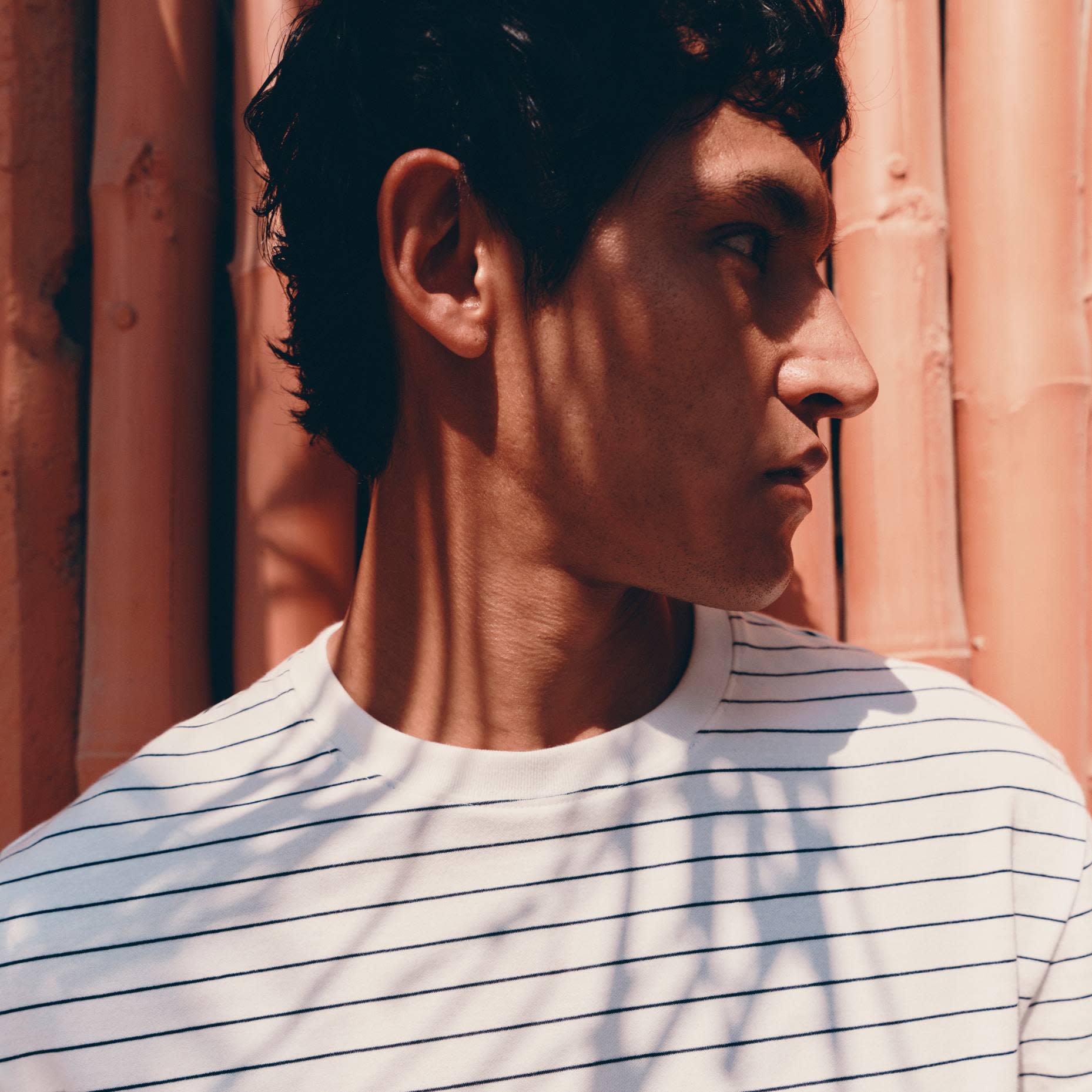 Man wearing striped t-shirt