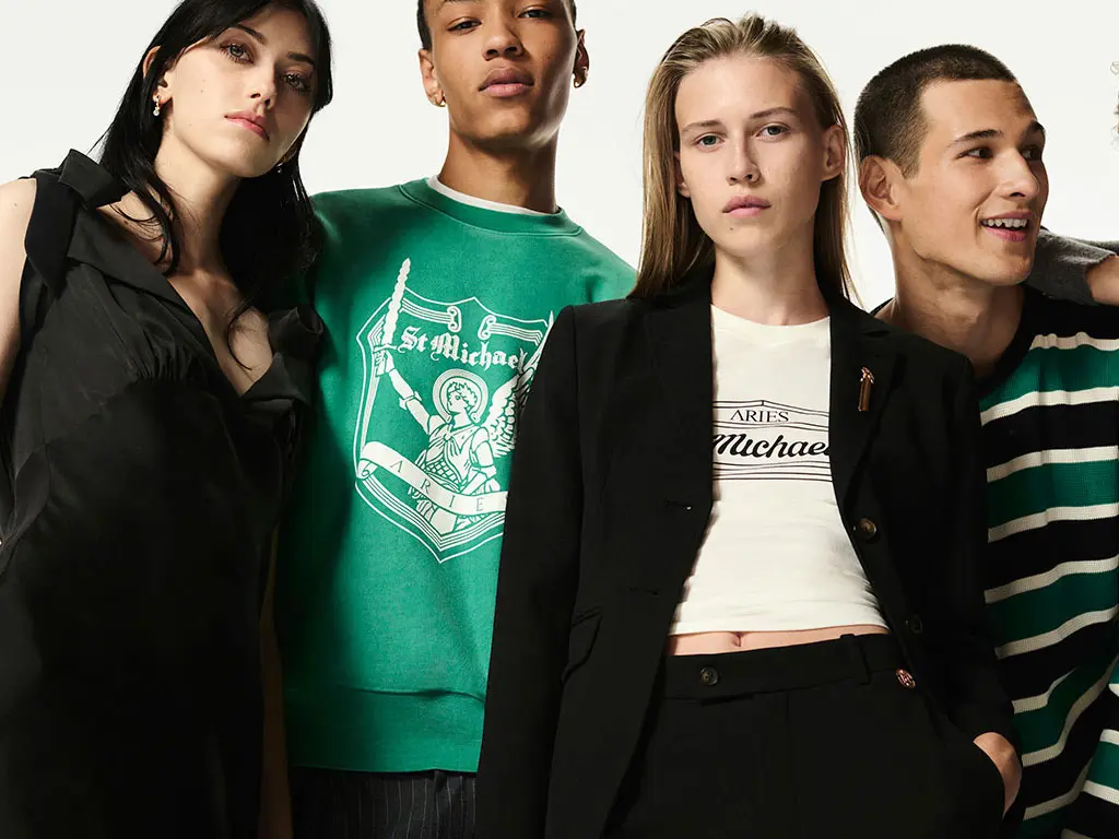 Group of men and women wearing M&S X Aries
