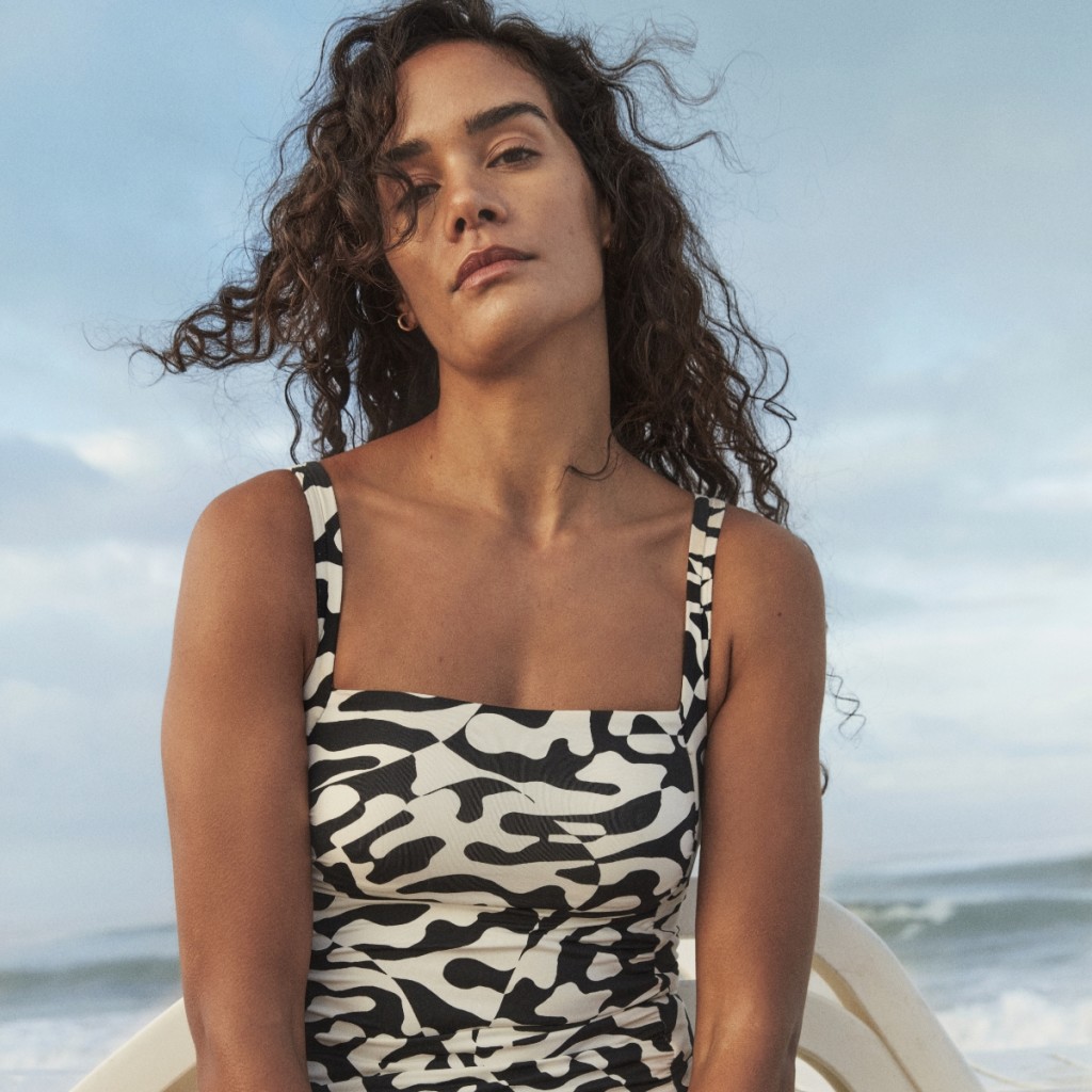 Women wearing zebra print swimwear suit. Shop Swimwear 