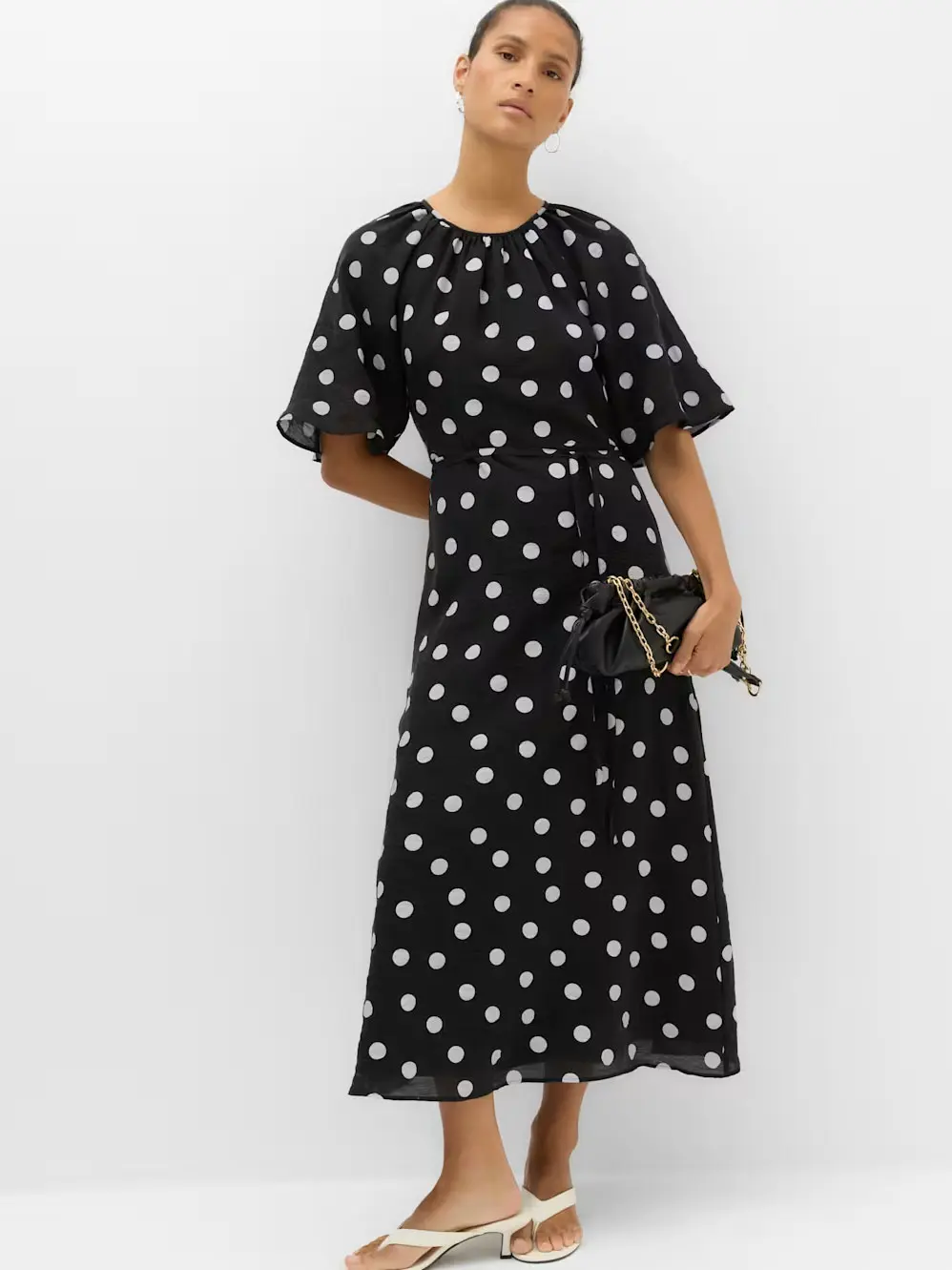 Woman in polka dot dress