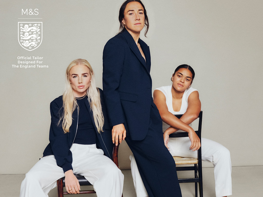 Members of the England women’s football team wearing the M&S | England collection