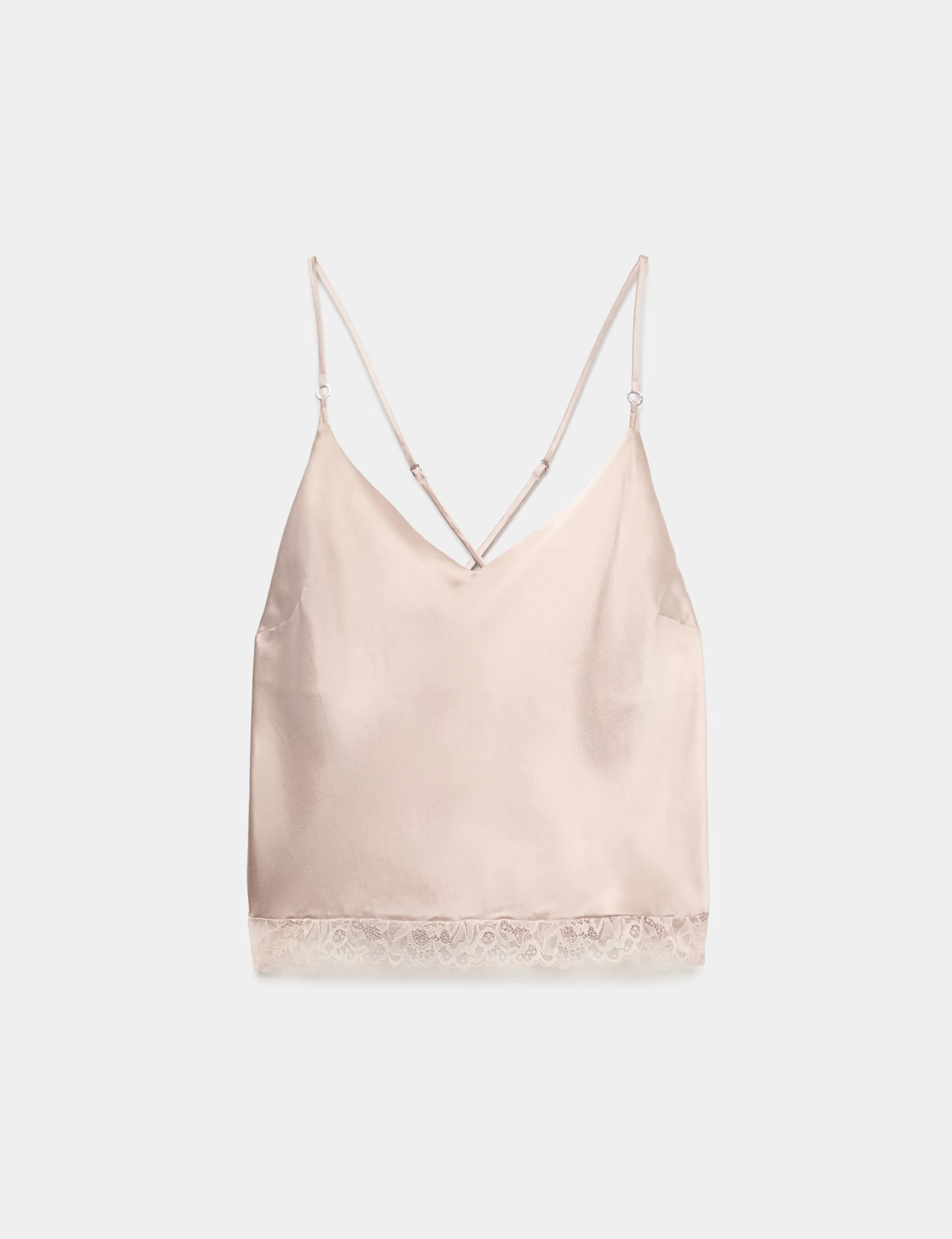 Pink cami top with a lace trim.
