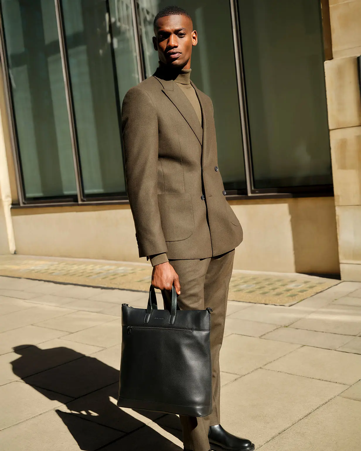 Man wearing suit from Autograph Performance